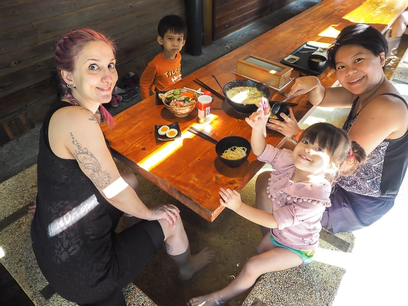 Soaking our feet while enjoying hot spring ramen, one of the best Jiaoxi restaurants