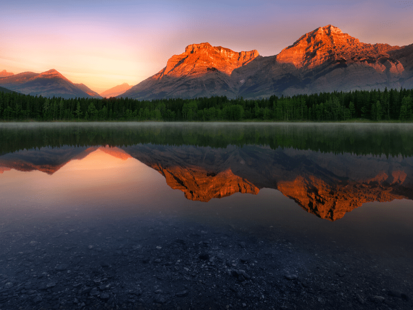 Sunrise over a lake in Kananaskis Country, Alberta