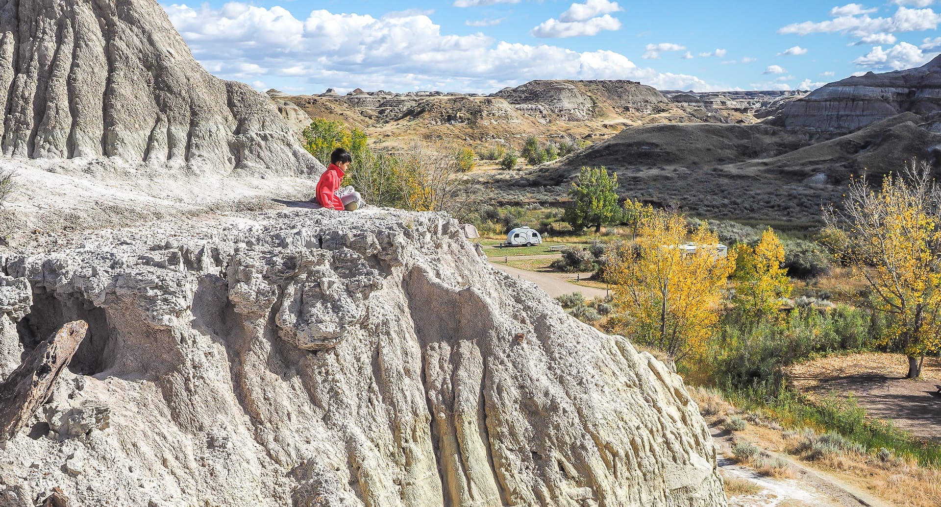 Boy looking over the Dinosaur Provincial Park Camping Site