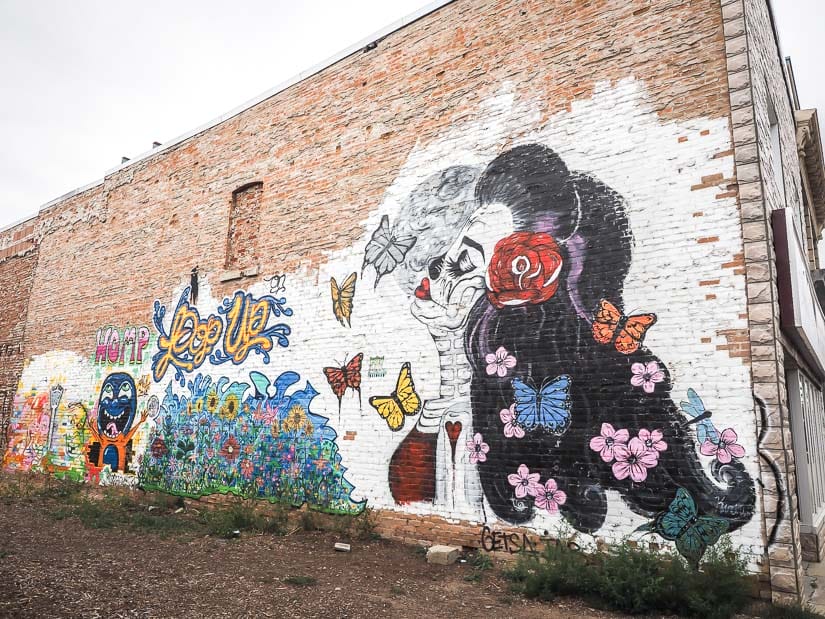 A painted mural on the side of a brick wall in Medicine Hat