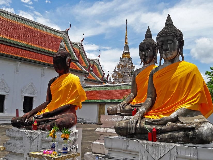 Statues of Buddhas meditating at a temple in Surat Thani, Thailand