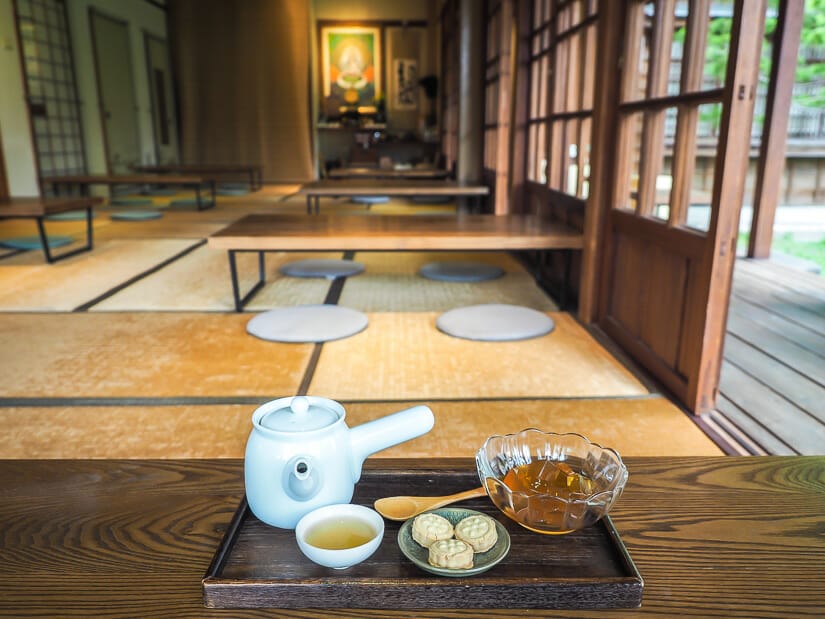 A tea set on a table in a traditional wooden Japanese teahouse in Taipei