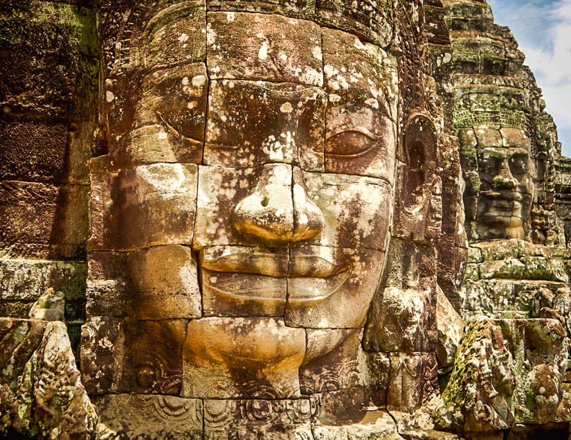Giant Buddha faces of the Bayon in Angkor Wat, Cambodia, one of the greatest temple ruins in Southeast Asia and the world