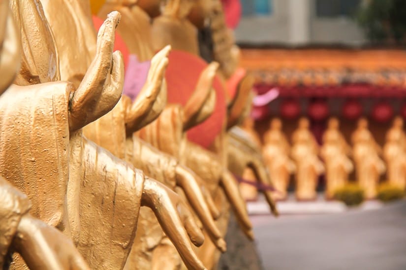 Rows of golden buddha hands at Ksitigarbha Shrine, one of the best things to do in Fo Guang Shan