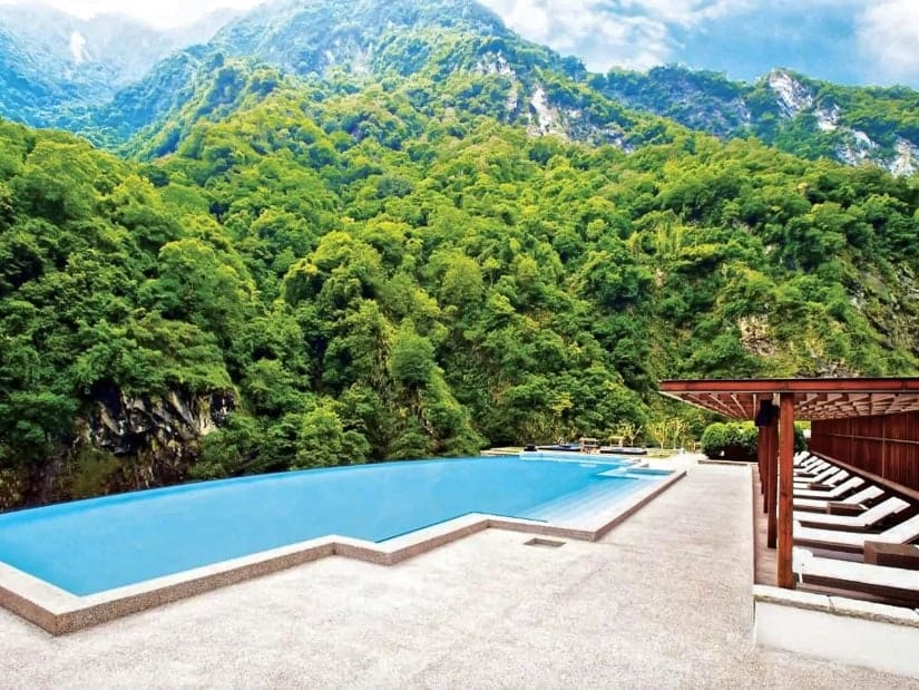 Pool backed by mountains at Silks Place, the best hotel in Hualien