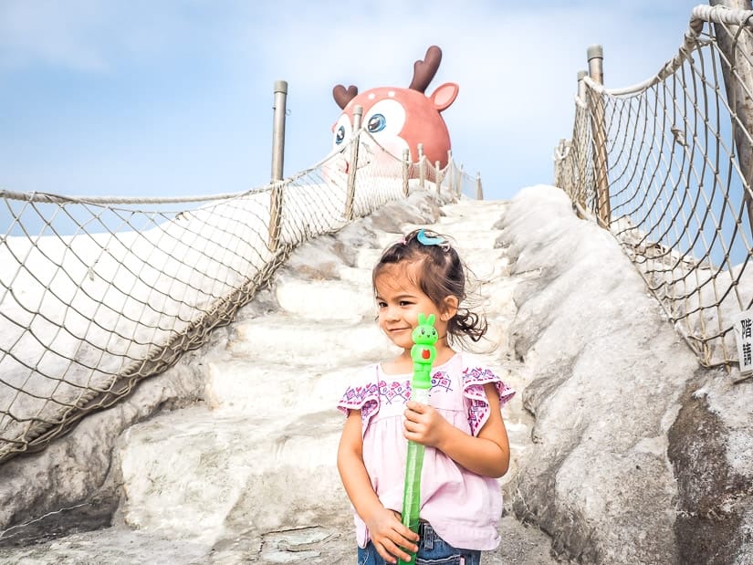 Young girl standing on Cigu Salt Mountain