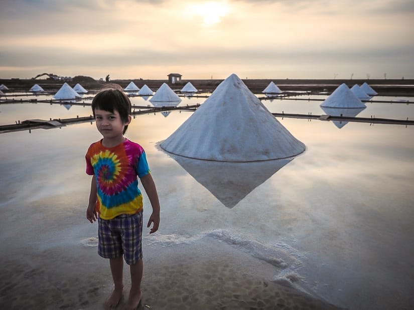 Young boy standing in a brine pool