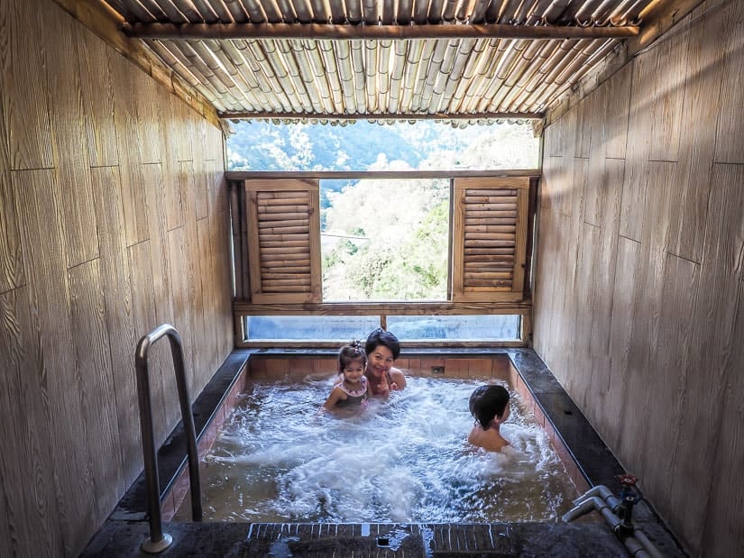 Mother and two children in a private hot spring bath at King's Resort Hotel, the best place to stay in Tai'an Hot Spring