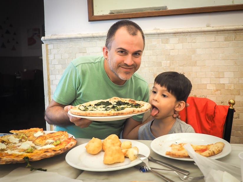 Eating pizza in Naples with kids