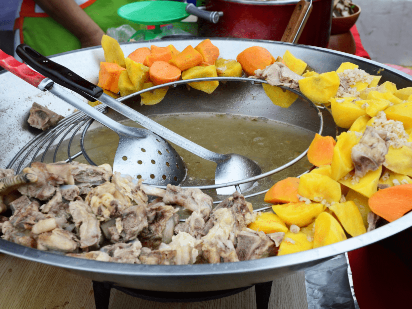 A large pot of Taiwanese medicinal pork ribs soup with sweet potatoes