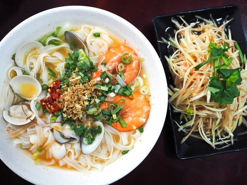 Vietnamese-style pho served in Taiwan with a raw papaya salad on the side