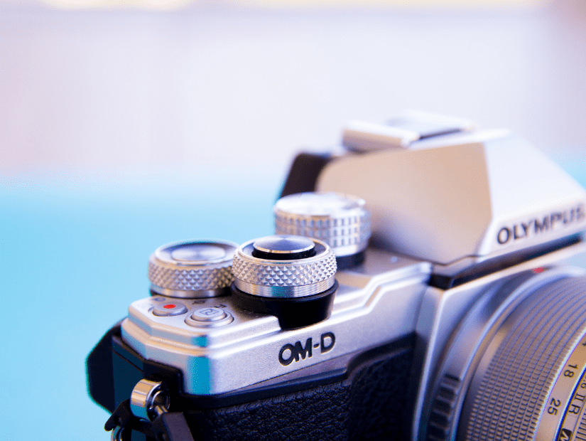 Close up of the buttons on the Olympus OMD EM5 Mark II mirrorless camera for travel