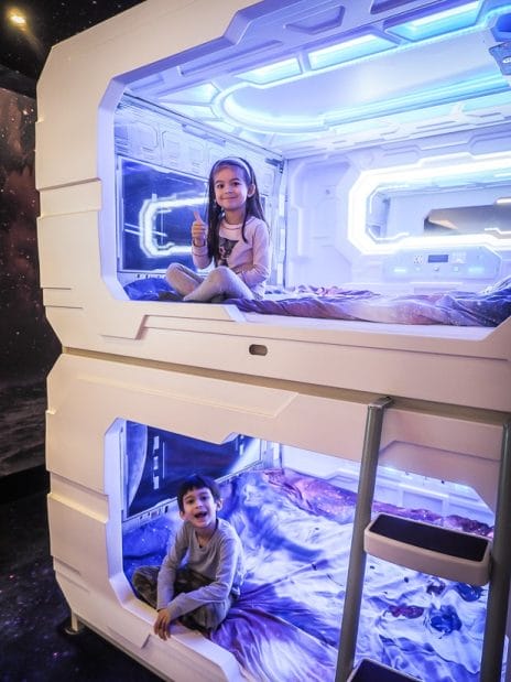 Our kids in their space bunk beds