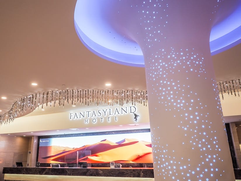 The check in desk and lobby of the Fantasyland Hotel