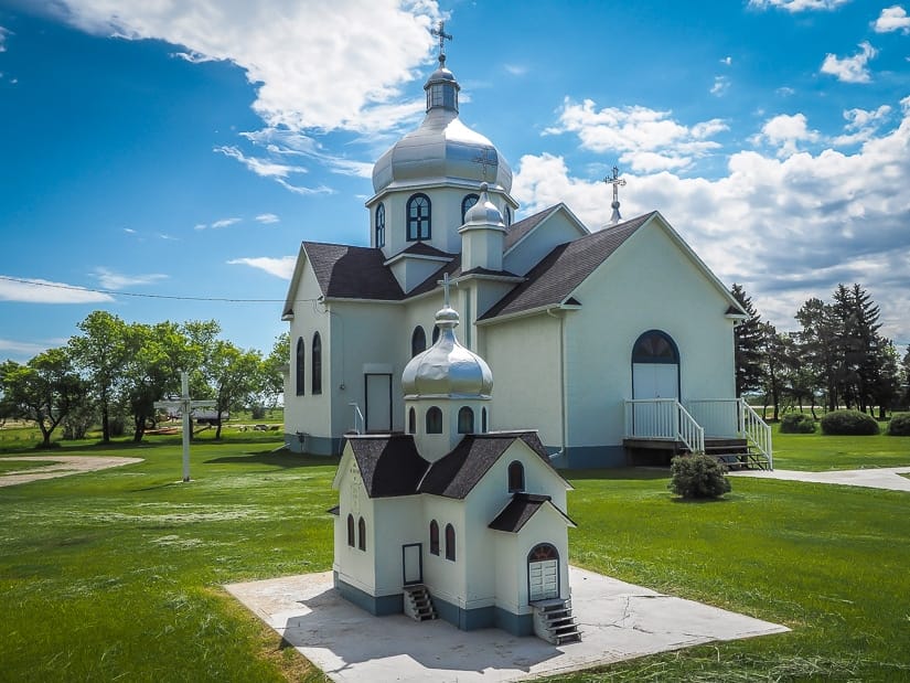 Miniature Ukrainian Church beside a real-sized one, a unique roadside attraction in Myrnam Alberta