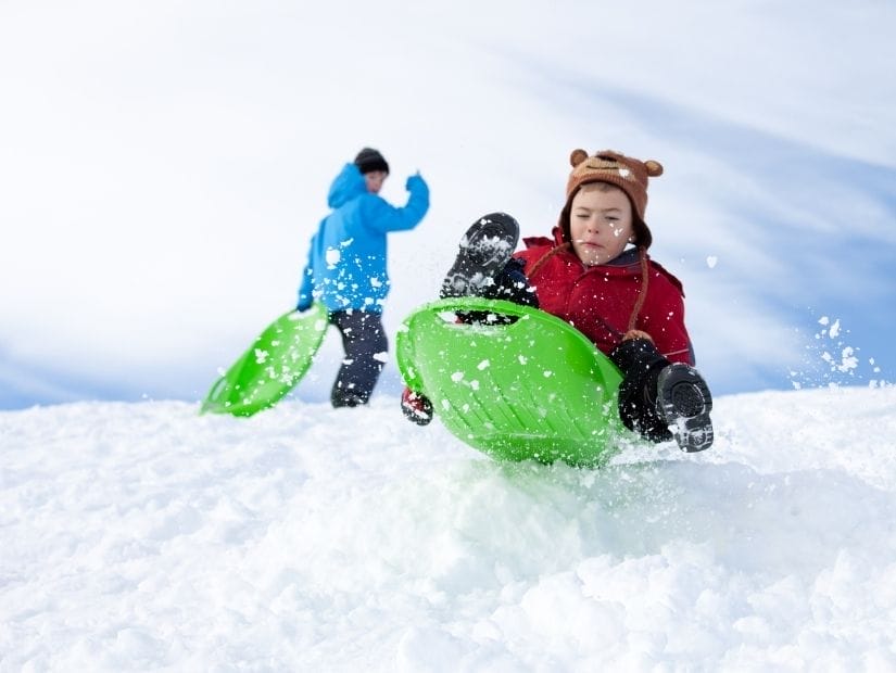 Some kids tobogganing in Jasper