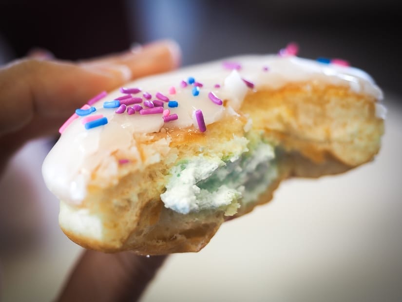 A donut with blue icing from the Donut Mill on Gasoline Alley in Red Deer