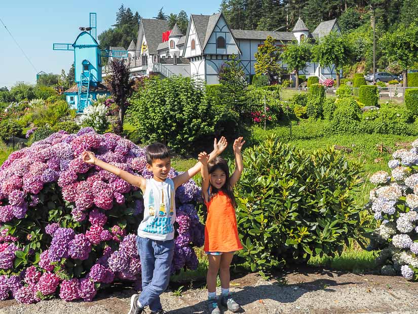 Two kids in front of Castle Fun Park, an amusement park in Abbotsford