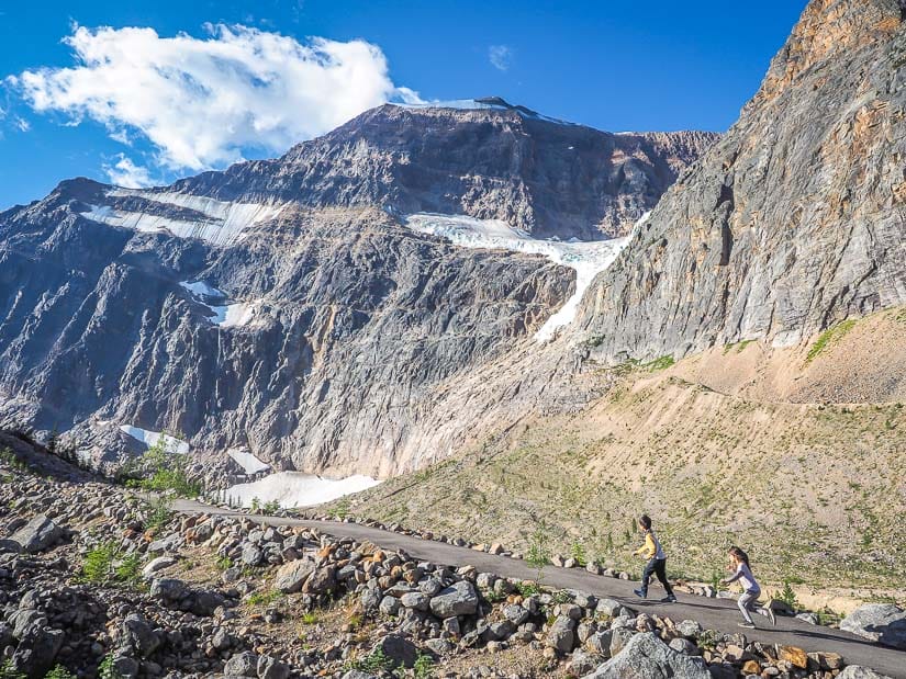 Two kids running up Edith Cavell Meadows Trail in Jasper