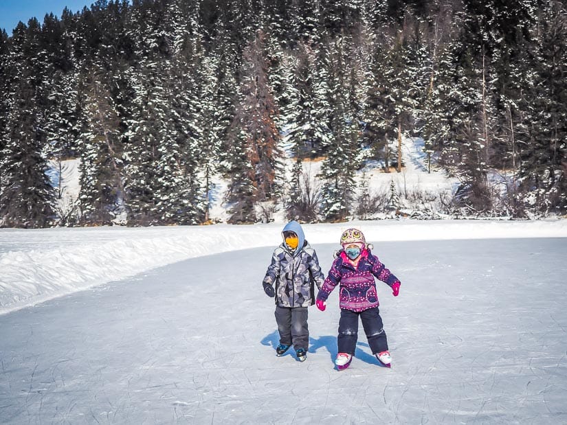 Two kids ice skating on Pyramid Lake