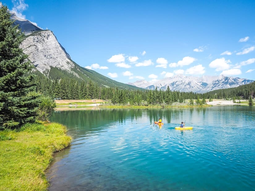 Some kids kayaking at Cascade Ponds, one of the best family activities in Banff