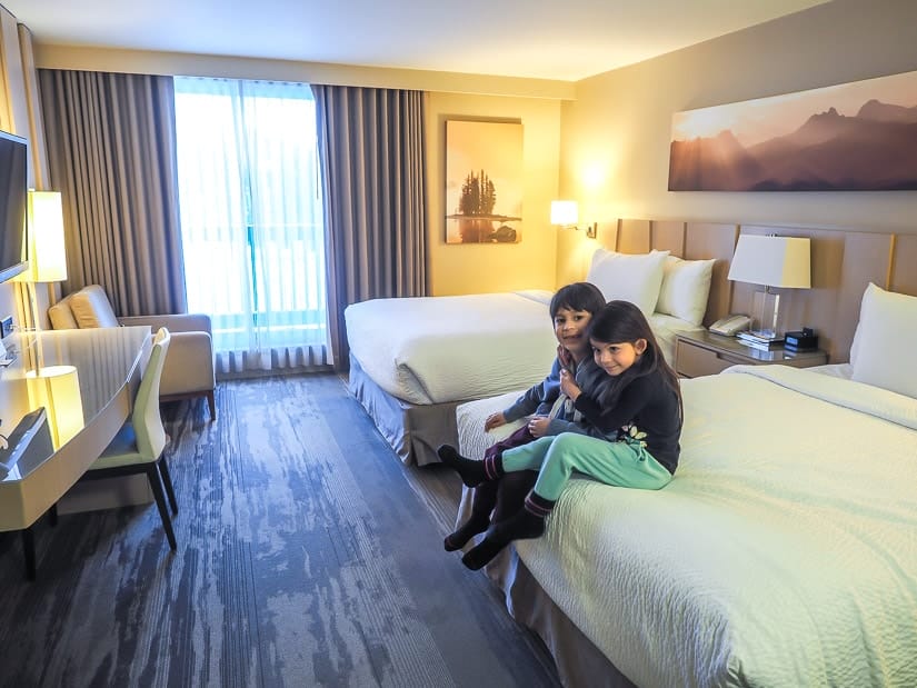 Our kids in the Sawridge Hotel in Jasper, one of the best places to stay with kids.