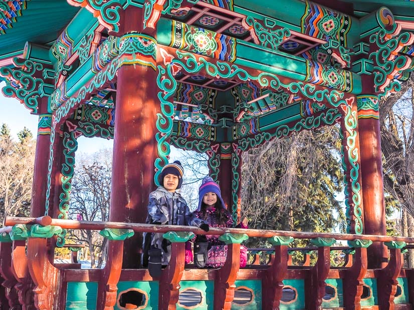 Two kids in the Korean Pavilion in Government House Park