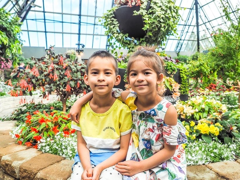 Two kids inside the Muttart Conservatory