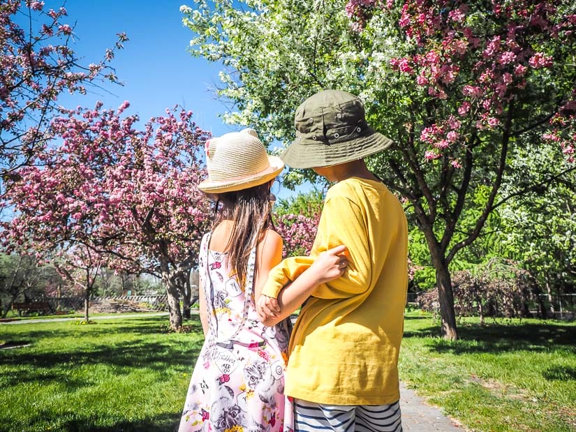 Two kids standing in a botanical park in St. Albert