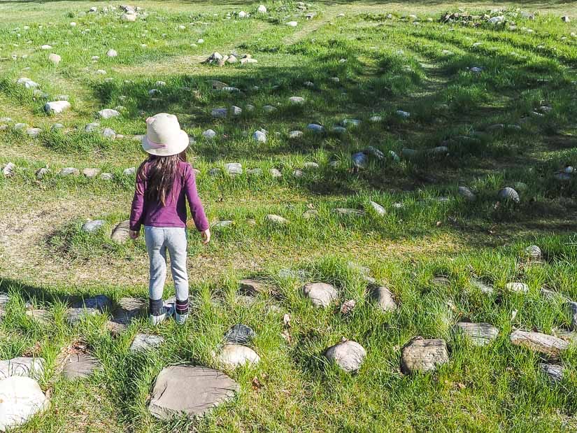 A girl walking in the Turtle Rock Effigy Layrinth 