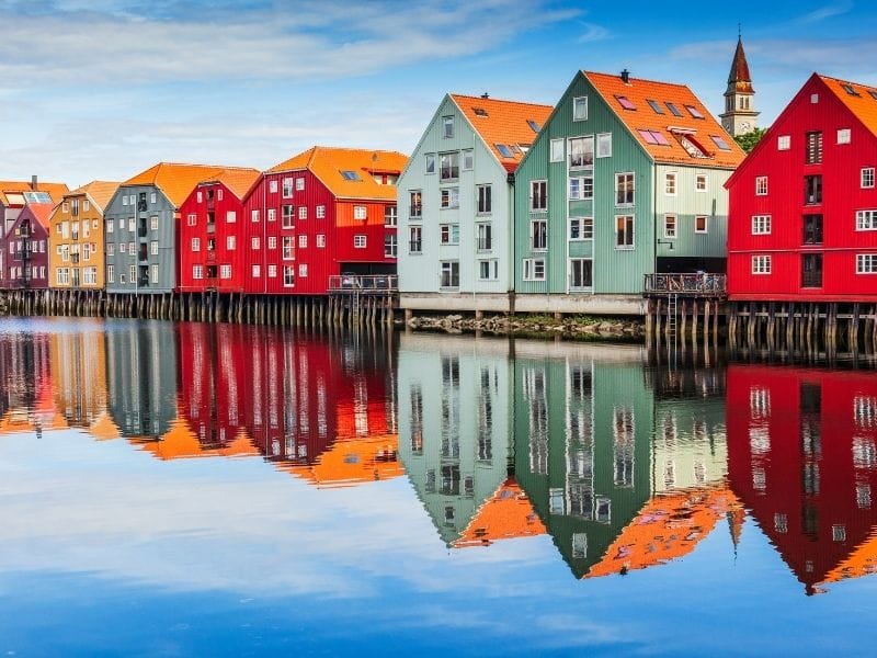 Colorful houses along the water in Trondheim Norway