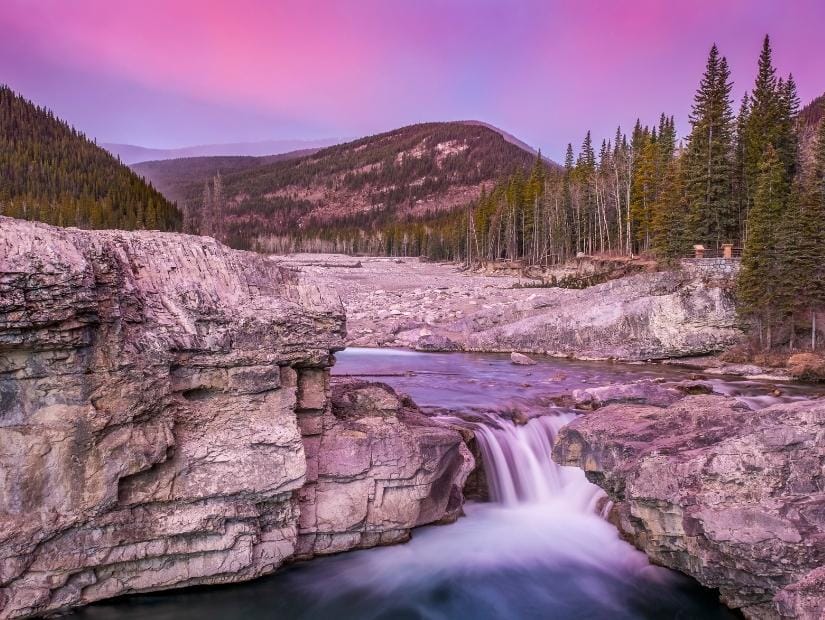 Elbow Falls, Kananaskis with a purple sky