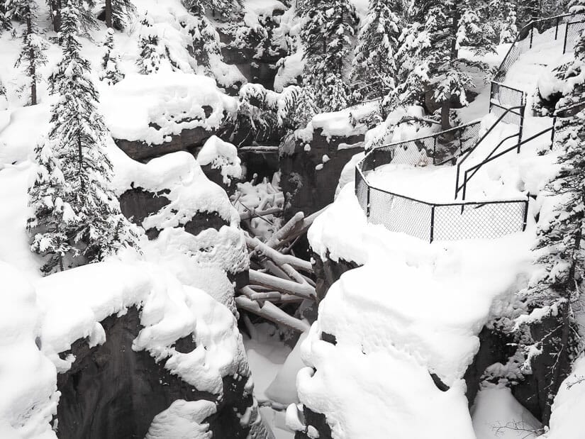 A snowy trail overlooking Maligne Canyon