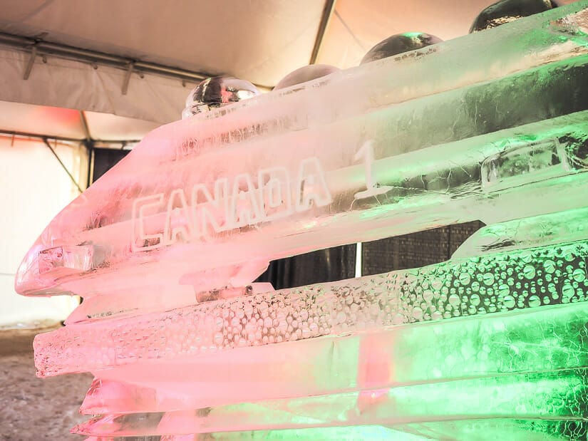 An ice sculpture of a bobsled with the word Canada on the side at Ice on Whyte in Edmonton