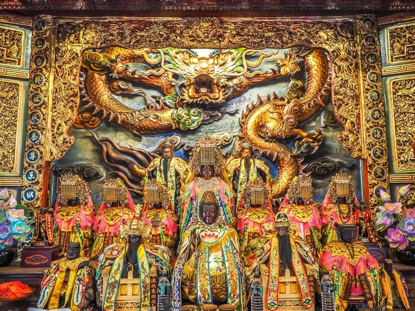 Various golds on an altar in the main room of Jishun Temple in Shenkeng