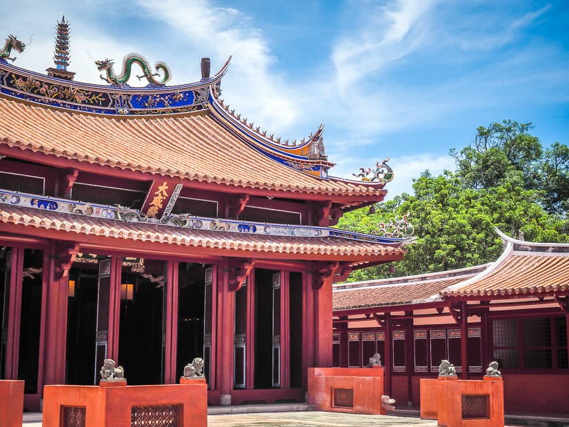 The exterior of the main hall of Tainan Confucius Temple with blue sky above