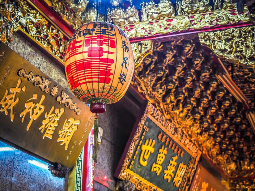 A red lantern inside a temple