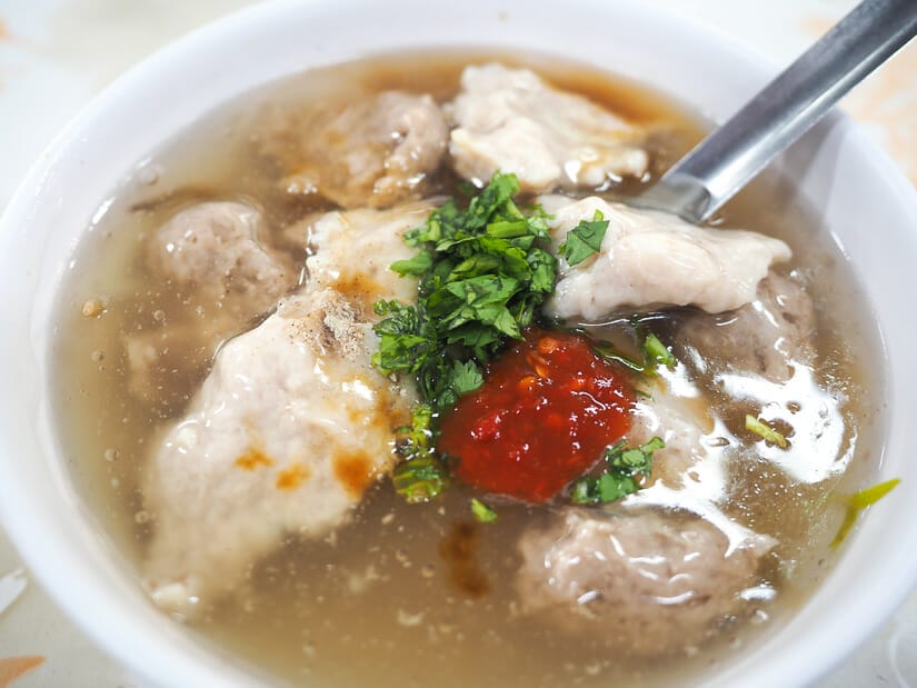 A close up of a bowl of swordfish stew