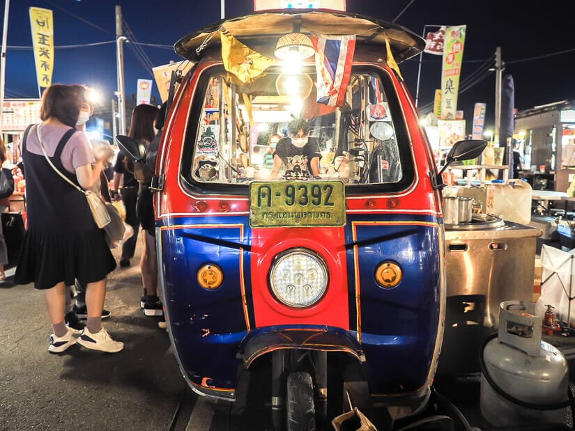 The front of a tuk tuk Thai iced tea stall in Flower Night Market