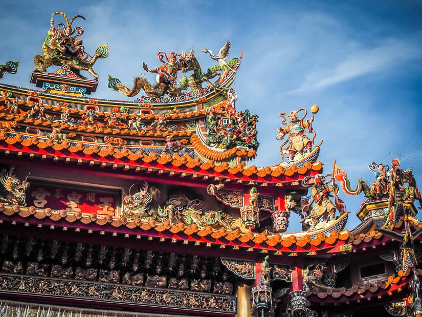 The colorful, intricate roof tiles and statues of Tainan's Jade Emperor Temple