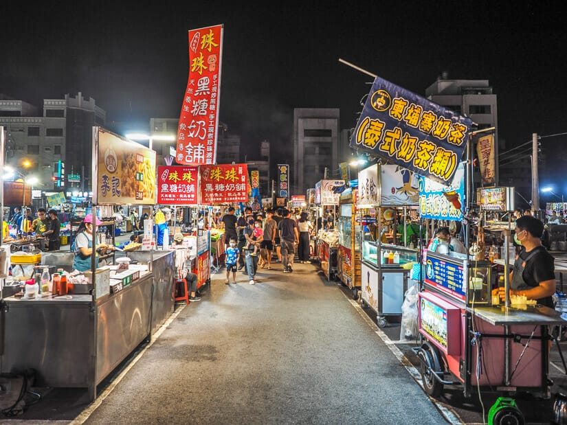 A relatively empty aisle between night market stalls at Xin Yong Hua Night Market in Anping, Tainan