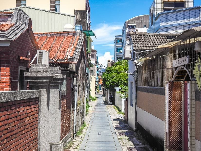 A narrow lane with traditional Anping houses on either side