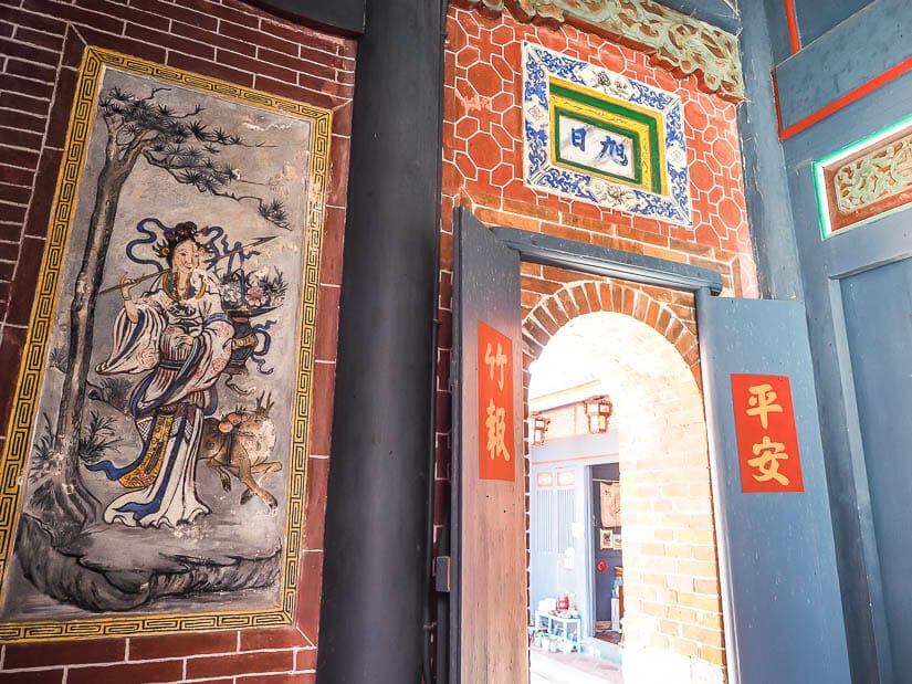 A Chinese painting and doorway inside Haishan Hall, Anping