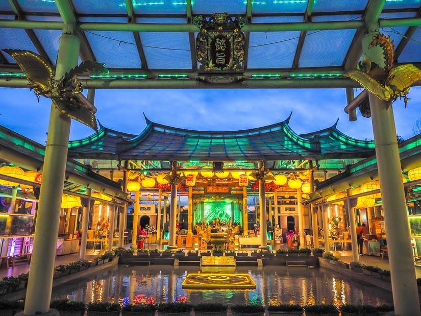 Lukang's glass temple inner courtyard with a darkening sky