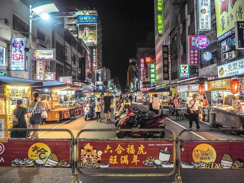 Looking past the barricade into the food stalls of Liuhe Night Market in Kaohsiung