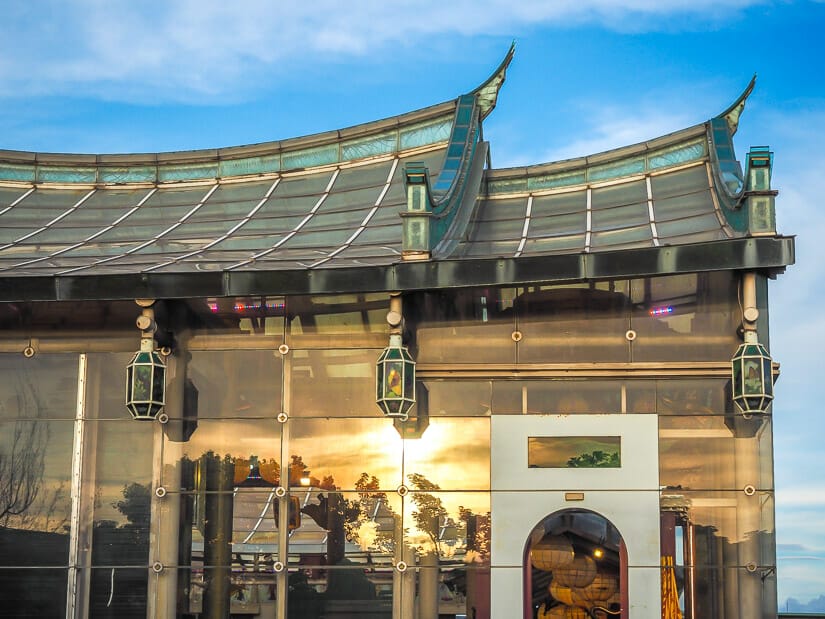 The exterior of the glass temple in Lukang reflecting the rays of the setting sun