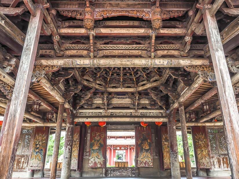 Wooden columns, beams, and roof inside the Lukang Lungshan Temple