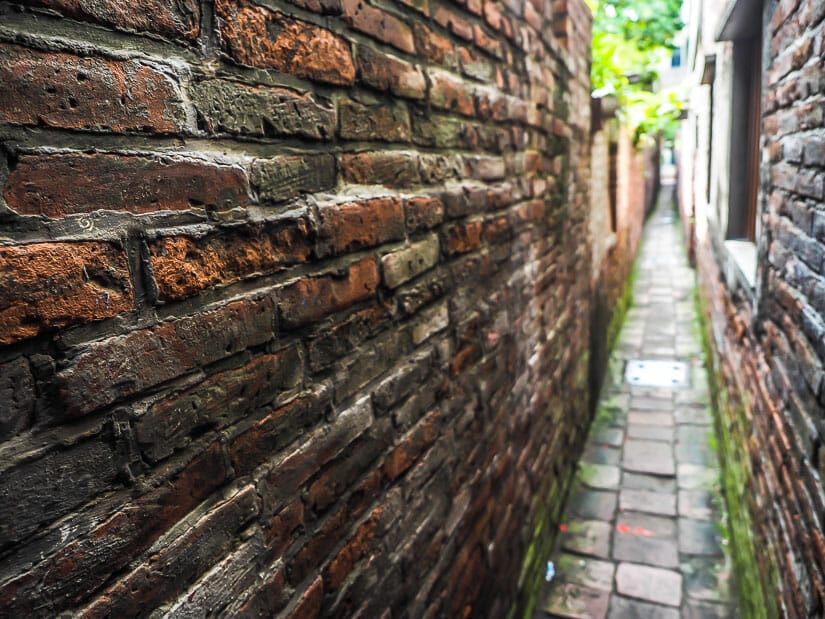 A narrow brick lane in Lukang called Moru Lane or Breast Touching Lane