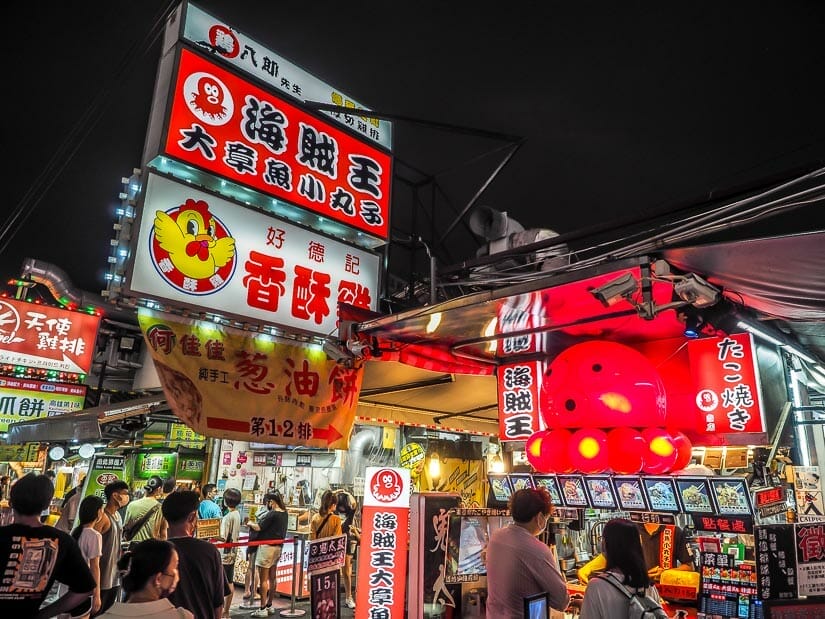 Food stalls and a red octopus statue at Ruifeng Night Market