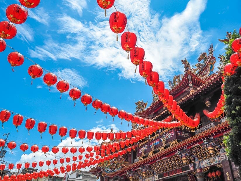Looking up at strings of red lanterns hung in front of Tzu Yun Yen temple in Qingshui, Taichung